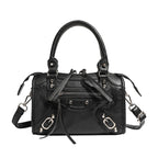 Ladies Mini handbag with decorative metal accents and detachable shoulder strap Nord Bags