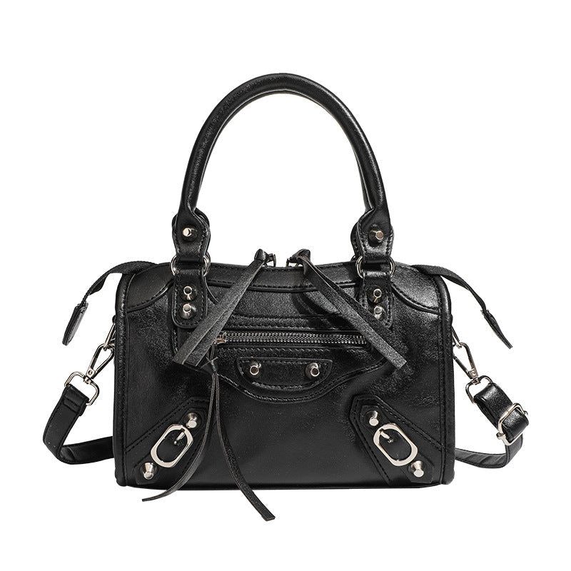 Ladies Mini handbag with decorative metal accents and detachable shoulder strap Nord Bags