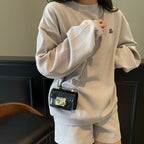 elegant mini handbag with gold closure mechanism