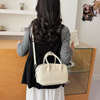 Women’s mini handbag with textured faux leather and elegant design