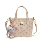 Women’s mini handbag in a charming design with removable pendant