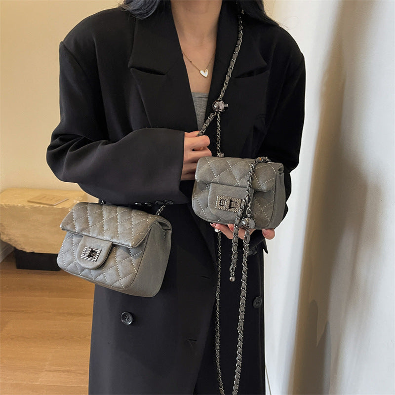 mini handbag with padded design and elegant chain strap