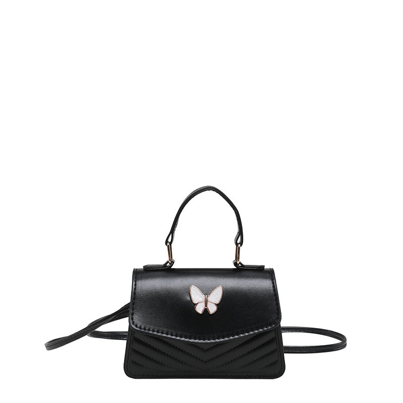 Chic Mini Handbag with Elegant Butterfly Accent