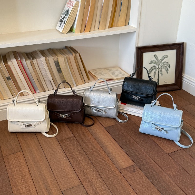 Women’s fashionable mini handbag with decorative magnetic closure
