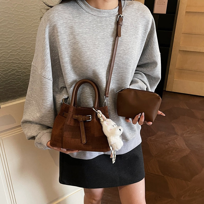 mini handbag with modern accents and practical interior organizer