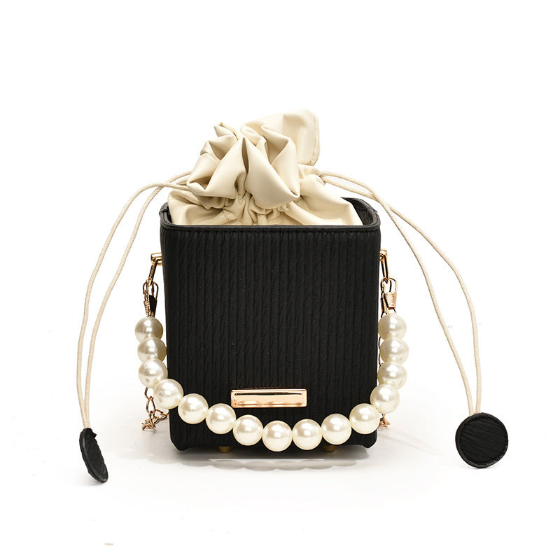 Ladies mini handbag with detachable pearl chain