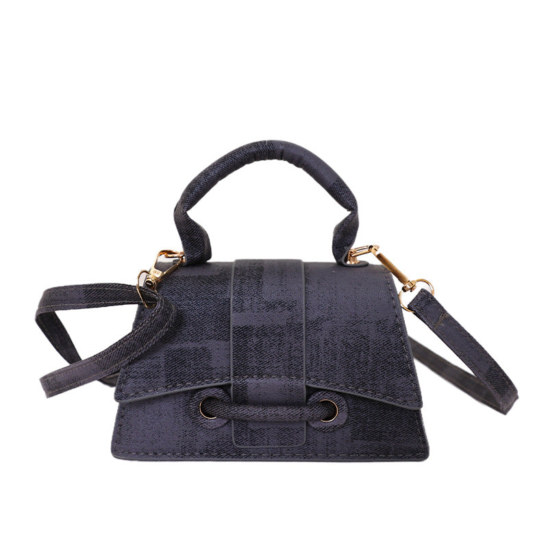 Ladies elegant mini handbag with textured design