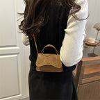 Ladies mini handbag with detachable carrying handle