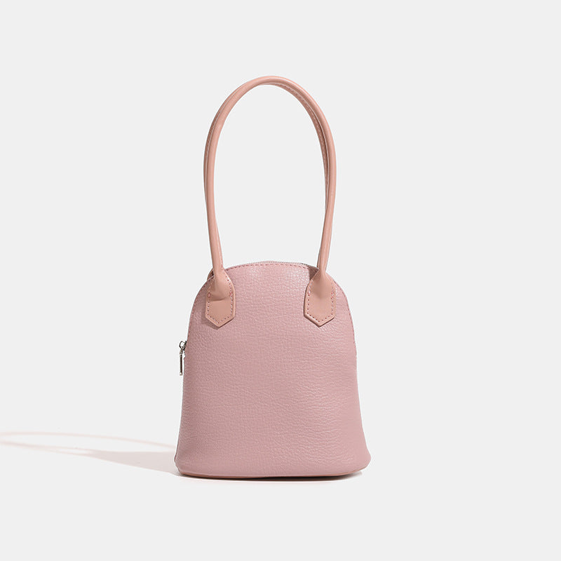 mini handbag in modern design with practical zipper