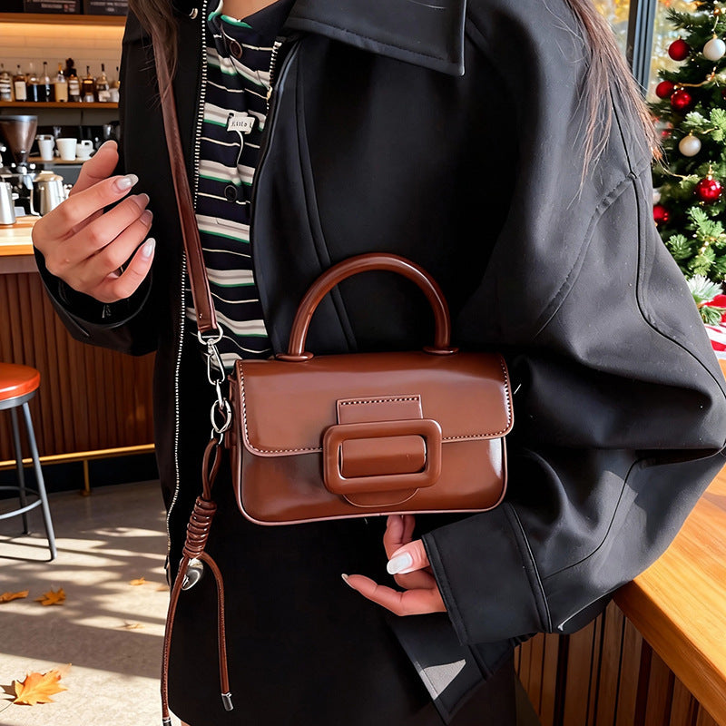 mini handbag with detachable shoulder strap and modern design