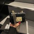 elegant mini handbag with gold closure mechanism