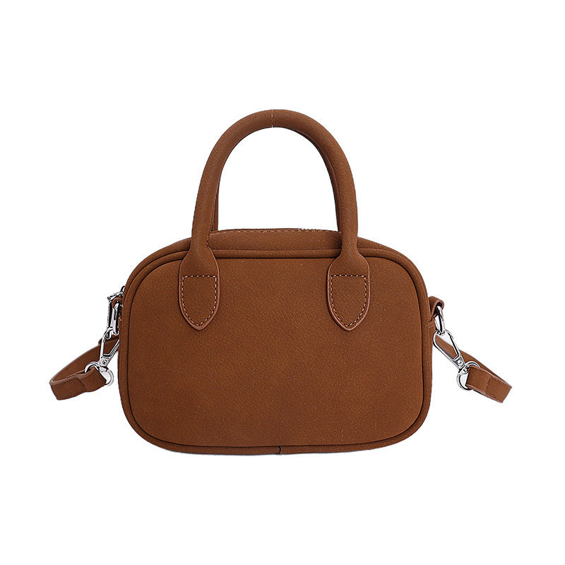 mini handbag with detachable shoulder strap and elegant design