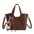 Ladies mini handbag in elegant design with charming pendant