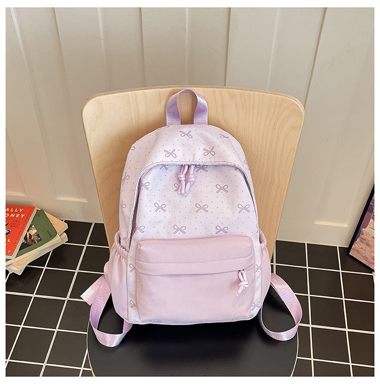 Cute everyday backpack with embroidered bows