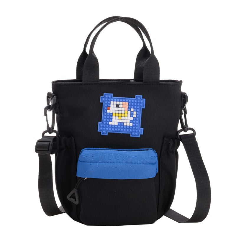 Mini handbag with colorful accents and practical carrying system