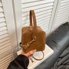 Women’s mini handbag with detachable shoulder strap and elegant flap closure