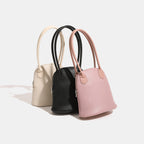 mini handbag in modern design with practical zipper