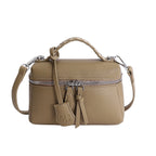 mini handbag with fine decorative seams and removable shoulder strap
