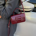 mini handbag with detachable shoulder strap and modern design