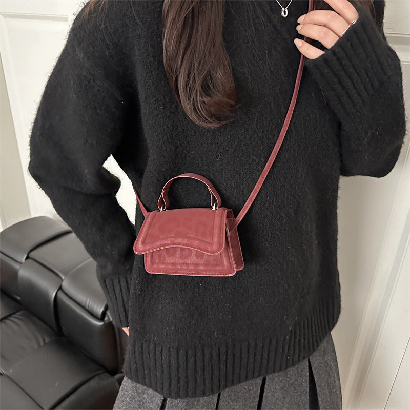 retro-style mini handbag with removable shoulder strap