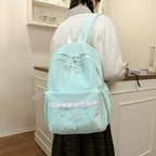 Backpack with elegant pearl applications and intricate design