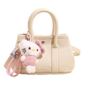 Ladies Mini Handbag with Playful Plush Pendant