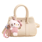 Ladies Mini Handbag with Playful Plush Pendant