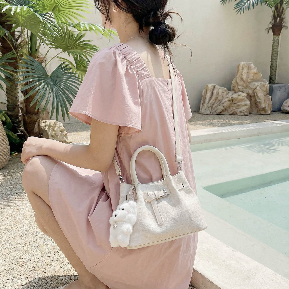 mini handbag with modern accents and practical interior organizer