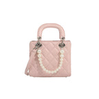 Women’s mini handbag with pearl-embellished chain and quilted design