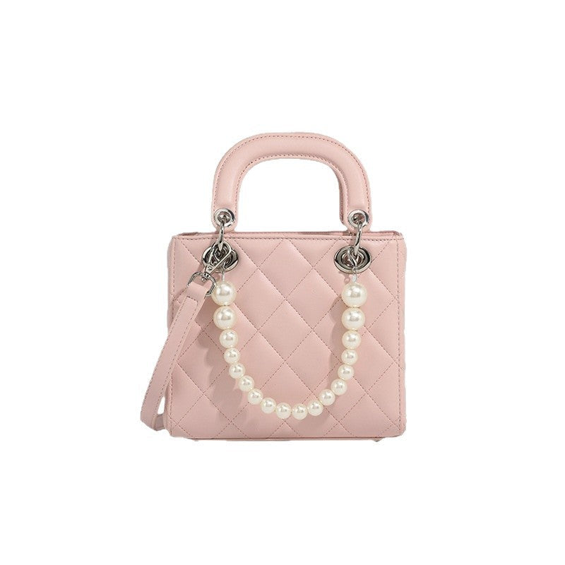 Women’s mini handbag with pearl-embellished chain and quilted design