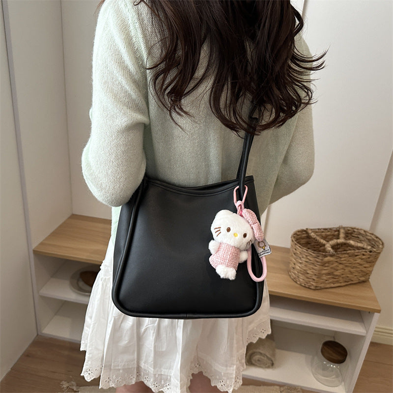 Ladies Mini-Handbag with playfully charming accessories