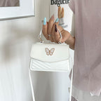 Chic Mini Handbag with Elegant Butterfly Accent
