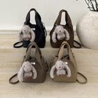 Women’s mini handbag with detachable plush pendant