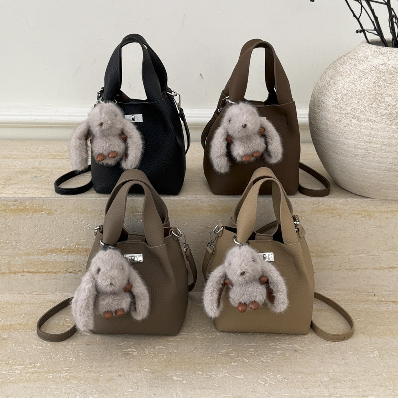 Women’s mini handbag with detachable plush pendant