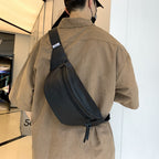 Belt bag with adjustable carrying strap and practical compartments