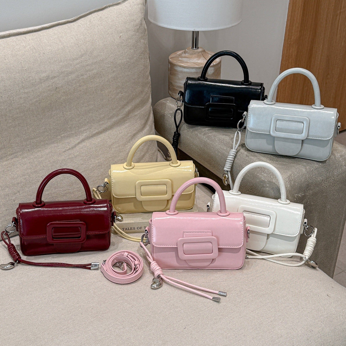 mini handbag with decorative snap closure