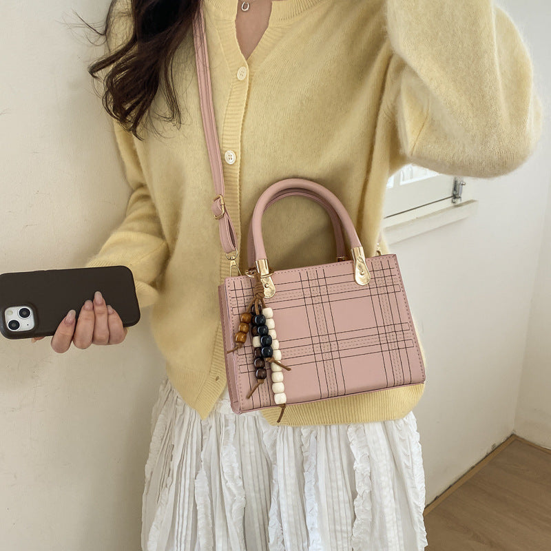 Mini Handbag with Elegant Structure and Golden Accents