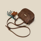 mini handbag with playful detail and high-quality synthetic leather