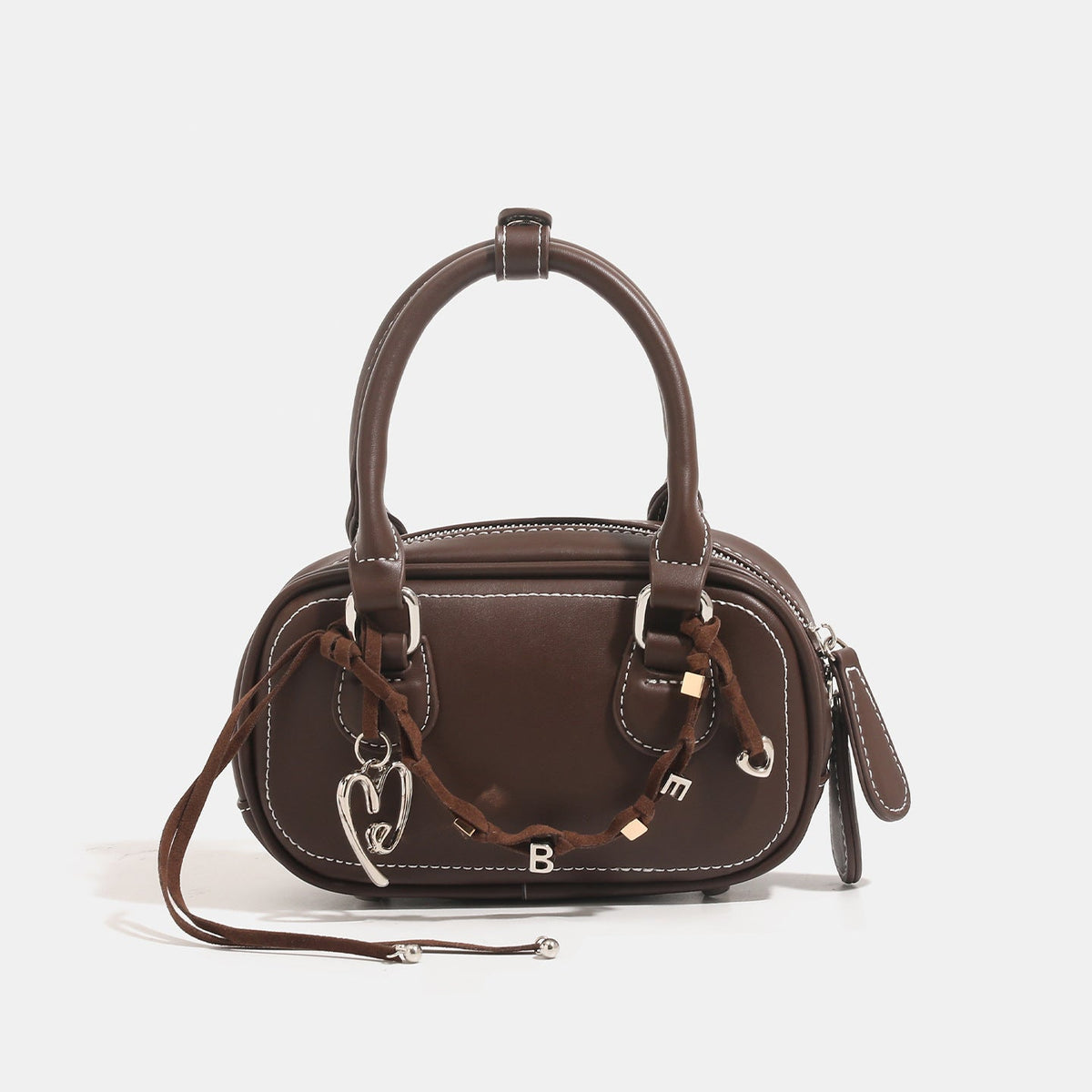 Ladies mini handbag with playful drawstring and elegant accents
