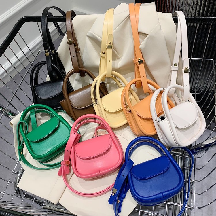 Ladies mini handbag with elegant chain accent