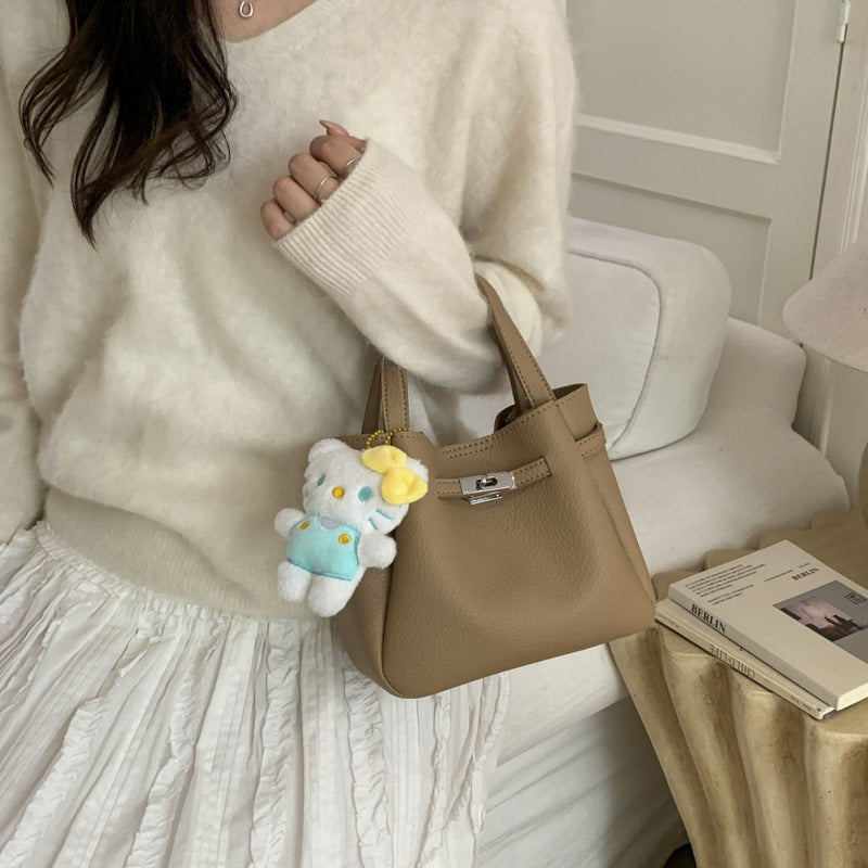 mini handbag with fluffy pendant