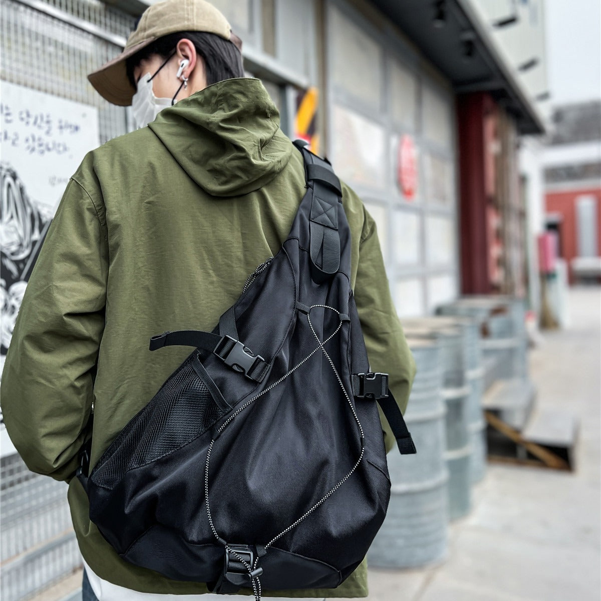 Sporty sling backpack with adjustable straps and practical organizer