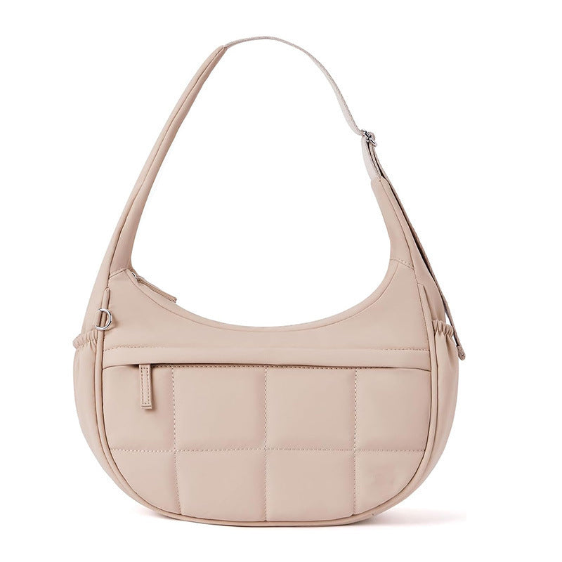 Fashionable shoulder bag with textured design