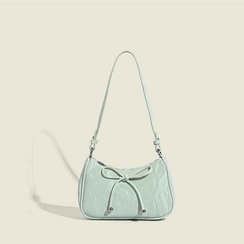 elegant mini handbag with playful drawstring Nord Bags