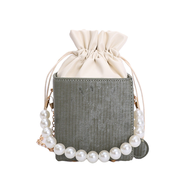 Women stylish mini handbag with drawstring and pearl accent Nord bags