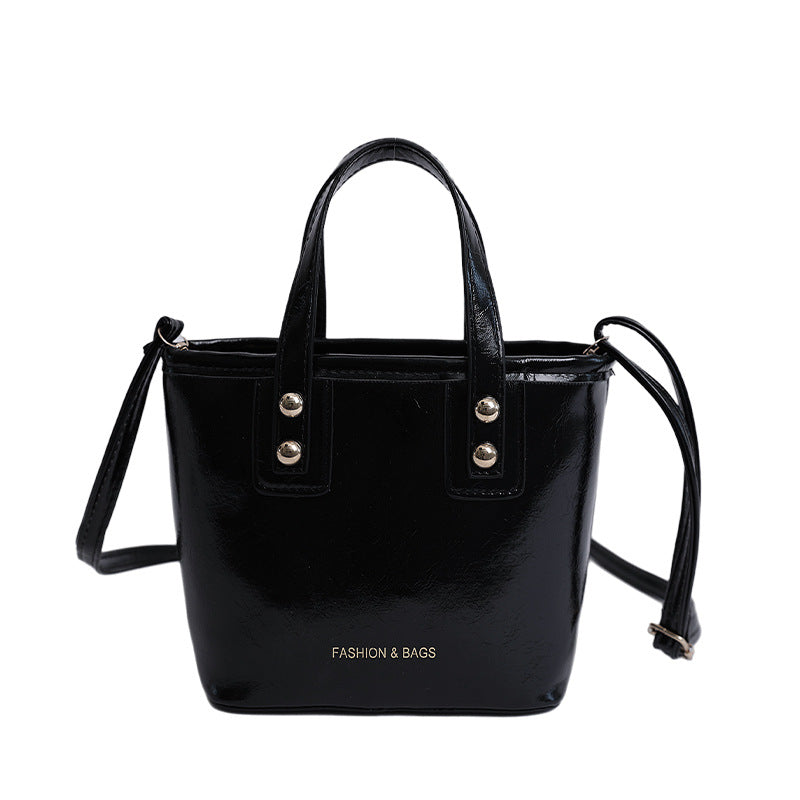 Women’s mini handbag with elegant carrying handle and practical inner compartment