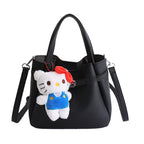 mini handbag with fluffy pendant