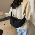 Shoulder bag with adjustable strap and multiple compartments