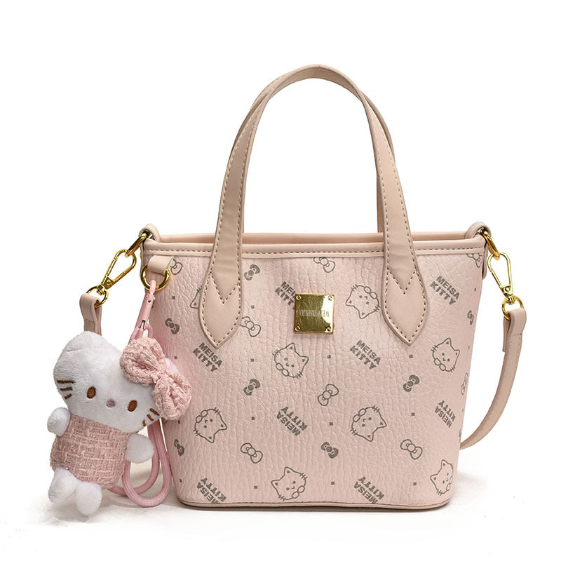 Women’s mini handbag in a charming design with removable pendant