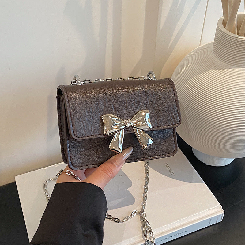 Charming Bow-Embellished Mini Handbag
